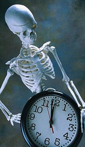 Skeleton Holding a Clock
